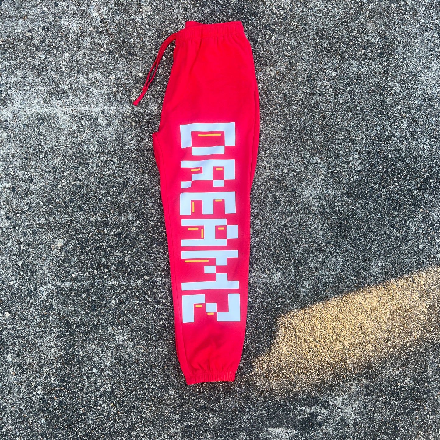 DREAMZ PIXEL SWEATPANTS (RED + WHITE/YELLOW)